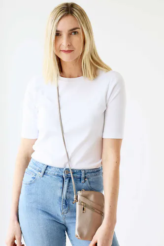 Model wearing Metallic Gold Long Cross Body Shoulder Strap Bag By Archer House Available at Beetees Nelson